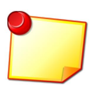 Żółta karteczka przypięta czerwoną pinezką.