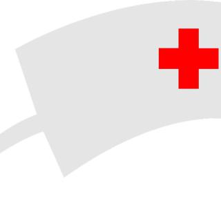 Biały czepek pielęgniarki z czerwonym krzyżem.